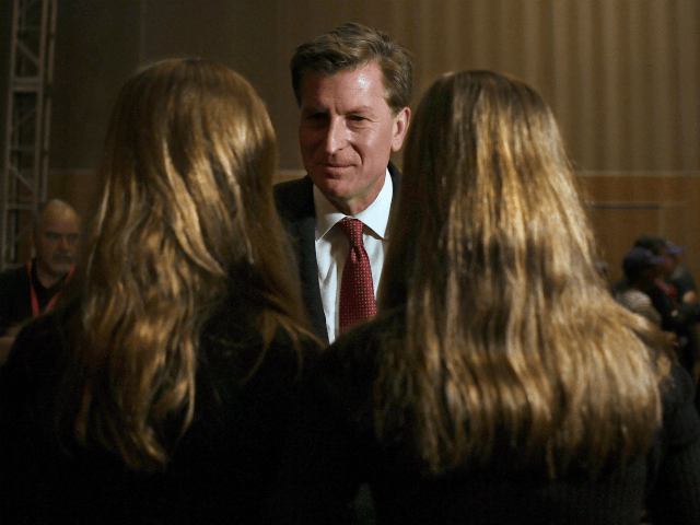 Candidate for governor Steve Obsitnik talks with his daughters at the State Republican Con