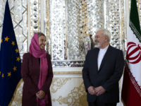 EU iran Iranian Foreign Minister Mohammad Javad Zarif (R) and EU foreign policy chief Federica Mogherini pose for a picture ahead of a joint news conference in the capital Tehran on July 28, 2015. Mogherini is in Tehran for talks on implementing this month's historic nuclear deal between Iran and the major …