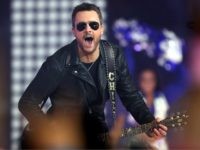 EricChurch1 Eric Church performs during halftime of the game between the Washington Redskins and Dallas Cowboys at AT&T Stadium on November 24, 2016 in Arlington, Texas. (Photo by Tom Pennington/Getty Images)