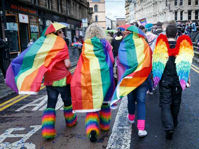 GLASGOW, SCOTLAND - AUGUST 19: Participants wear rainbow flags and angel winfs during the Glasgow Pride march on August 19, 2017 in Glasgow, Scotland. The largest festival of LGBTI celebration in Scotland has been held every year in Glasgow since 1996. (Photo by Robert Perry/Getty Images)