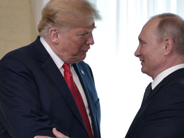 US President Donald Trump (C) shakes hands with Russia's President Vladimir Putin next to US First Lady Melania Trump (L) ahead a meeting in Helsinki, on July 16, 2018. - The US and Russian leaders opened an historic summit in Helsinki, with Donald Trump promising an "extraordinary relationship" and Vladimir …
