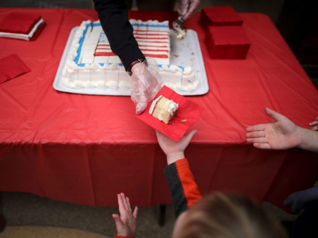 MOUNT VERNON, VA - FEBRUARY 22: Red, white and blue cake is served as part of the birthda