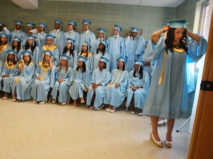 BOOTHVILLE, LA - MAY 21: Members of the 2008 graduating class of South Plaquemines High School wait for the start of their commencement May 21, 2008 in Boothville, Louisiana. South Plaquemines High School, nicknamed the Hurricanes, was formed in the aftermath of Hurricane Katrina by merging three destroyed high schools …