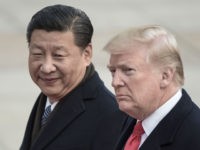 CHINA-US-DIPLOMACY China's President Xi Jinping (L) and US President Donald Trump attend a welcome ceremony at the Great Hall of the People in Beijing on November 9, 2017. / AFP PHOTO / FRED DUFOUR (Photo credit should read FRED DUFOUR/AFP/Getty Images)