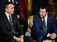 GettyImages-965192442 Italys Labor and Industry Minister and deputy PM Luigi Di Maio (L) and Italys Interior Minister and deputy PM Matteo Salvini smile before the swearing in ceremony of the new government at Quirinale Palace in Rome on June 1, 2018. - Italian cabinet members of the new government led by …