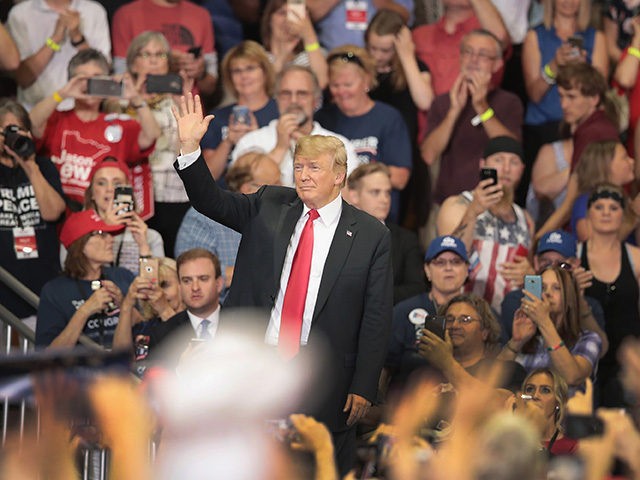 DULUTH, MN - JUNE 20: President Donald Trump greets supporters after speaking during a campaign rally at the Amsoil Arena on June 20, 2018 in Duluth Minnesota. Earlier today President Trump signed an executive order to keep undocumented families together as outcry continued to grow over the policy of separating …