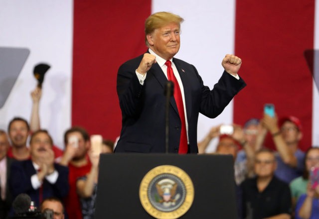 FARGO, ND - JUNE 27: U.S. president Donald Trump greets supporters during a campaign rally at Scheels Arena on June 27, 2018 in Fargo, North Dakota. President Trump held a campaign style "Make America Great Again" rally in Fargo, North Dakota with thousands in attendance. (Photo by Justin Sullivan/Getty Images)