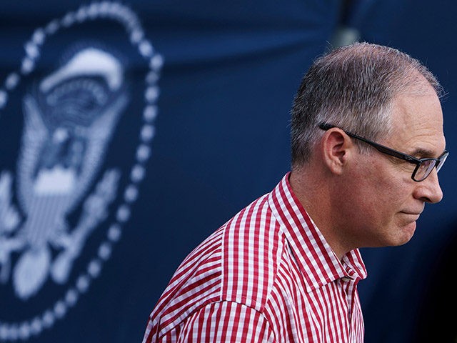 Environmental Protection Agency Administrator Scott Pruitt walks during an Independence Da