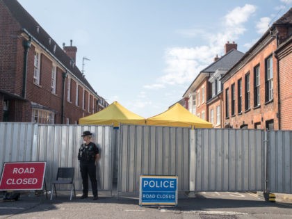 SALISBURY, ENGLAND - JULY 09: Police stand guard on a cordon outside the John Baker House Sanctuary Supported Living in Salisbury on July 9, 2018 in Wiltshire, England. Police have launched a murder enquiry after Dawn Sturgess, 44, died after being exposed to the nerve agent Novichok. In March, Russian …