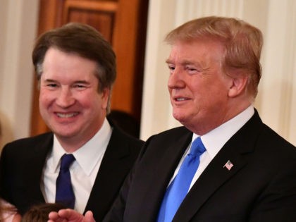 Supreme Court nominee Brett Kavanaugh, his wife Ashley Estes Kavanaugh (off frame) and the