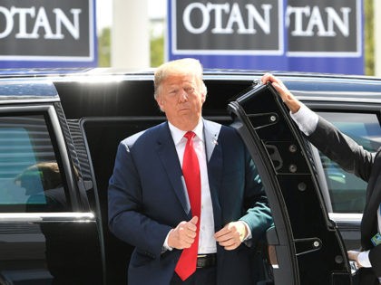 US President Donald Trump (C) arrives to attend the NATO (North Atlantic Treaty Organization) summit, in Brussels, on July 11, 2018. (Photo by EMMANUEL DUNAND / AFP) (Photo credit should read EMMANUEL DUNAND/AFP/Getty Images)