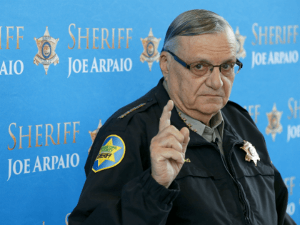 In this Dec. 18, 2013 file photo, Maricopa County Sheriff Joe Arpaio pauses as he answers