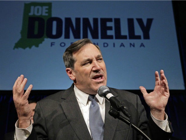 Democrat Joe Donnelly thanks supporters after winning the U.S. Senate seat over Republican Richard Mourdock at an election night celebration in Indianapolis, Tuesday, Nov. 6, 2012. (AP Photo/Michael Conroy)
