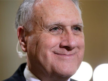 Supercommittee member Sen. Jon Kyl, R-Ariz., smiles during a TV interview about the deficit reducing panel's unfinished work Monday morning on Capitol Hill as their deadline approaches with little expectation for success, in Washington, Nov. 21, 2011. (AP Photo/J. Scott Applewhite)