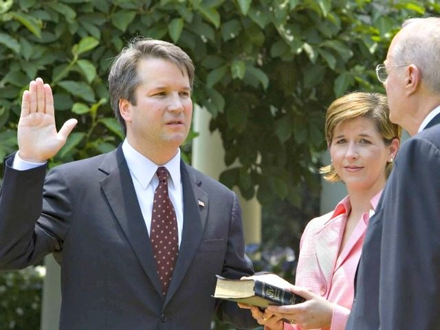 Justice Anthony Kennedy administers the oath to Judge Kavanaugh, 2006.
