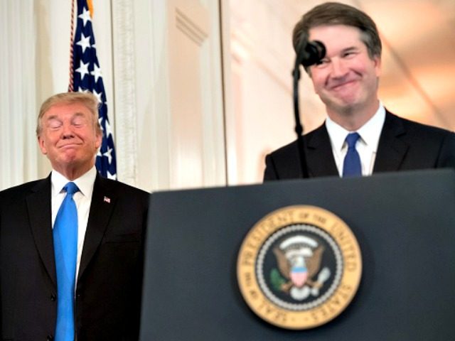 US Judge Brett Kavanaugh speaks after being nominated by US President Donald Trump (L) to