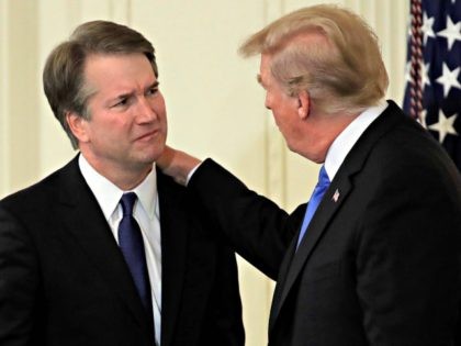 President Donald Trump greets Judge Brett Kavanaugh his Supreme Court nominee, in the East Room of the White House, Monday, July 9, 2018, in Washington.