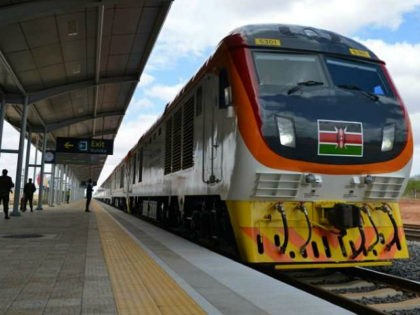One of Kenya's newly acquired standard gauge rail locomotive, carrying Kenyan President pulls into Voi railway station on May 31, 2017 in Voi, during an inaugural ride on Kenya's new standard gauge railway from the coastal city of Mombasa to the capital, Nairobi. Kenya's President Uhuru Kenyatta on Wednesday inaugurated …