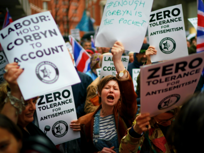 LONDON, ENGLAND - APRIL 08: Campaigners from the Campaign Against Antisemitism demonstrate and listen to speakers outside the Labour Party headquarters on April 8, 2018 in London, England. Protesters are calling on Labour's hierarchy to 'hold Jeremy Corbyn to account' after claims that he and the party are not doing …