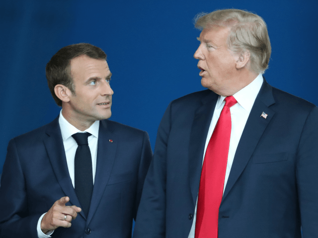 France's President Emmanuel Macron (L) and US President Donald Trump (R) arrive for the NA