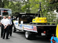 'Made in America' Event President Donald Trump talks with City Machine Technologies president and general manager Michael Kovach, left, and his son, vice president of engineering Chip Kovach, as they look at an industrial magnet as he participates in a "Made in America Product Showcase" at the White House, Monday, July 23, 2018, in …