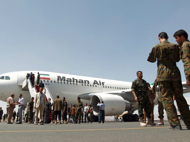 An airplane of Mahan Air sits at the tarmac after landing at Sanaa International Airport i