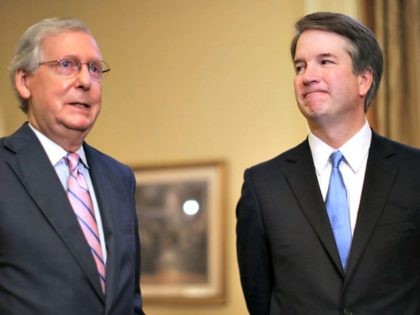 WASHINGTON, DC - JULY 10: Senate Majority Leader Mitch McConnell (R-KY) (L) makes brief remarks before meeting with Judge Brett Kavanaugh in McConnell's office in the U.S. Capitol July 10, 2018 in Washington, DC. U.S. President Donald Trump nominated Kavanaugh to succeed retiring Supreme Court Associate Justice Anthony Kennedy.