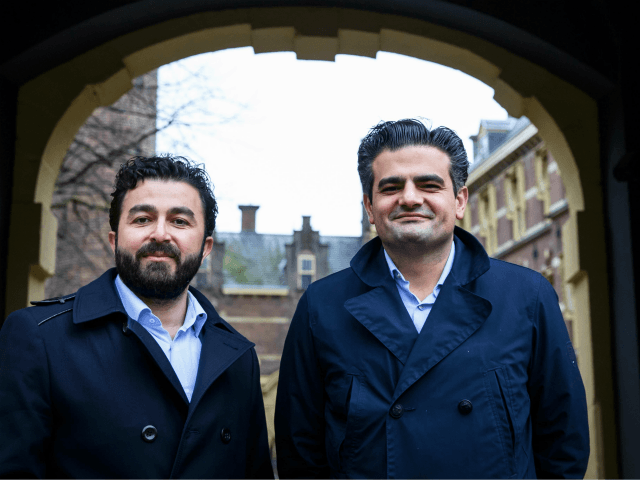 Leader of DENK ('think' in Dutch), the country's first party led by immigrants, Tunahan Kuzu (R) and Selcuk Ozturk pose at the Binnenhof in The Hague, on February 23, 2017