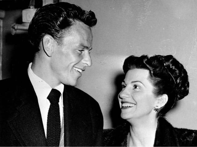 In this Oct. 23, 1946 file photo, singer Frank Sinatra and his wife Nancy smile broadly as
