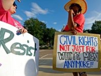 Oppose Kavanaugh Two protesters confer during a rally opposing the nomination of Judge Brett Kavanaugh to the U.S. Supreme Court, Tuesday, July 10, 2018, in Jackson, Miss. Planned Parenthood organizations rallied nationwide to protest the nomination of Kavanaugh. Abortion rights advocates fear the shutting down of the state's only abortion clinic should …