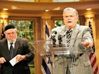 Pastor John Hagee Rabbi Aryeh Scheinburg, left, of Congregation Rodefei Shalom Synagogue in San Antonio, listens as the Rev. John Hagee speaks during a news conference held at the Cornerstone Church in San Antonio on Friday, May 23, 2008. The Texas pastor and televangelist says his life's work has been "mischaracterized and attacked" …