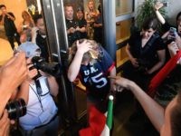 Rachel Casey gets egged (Josh Edelson / AFP / Getty)