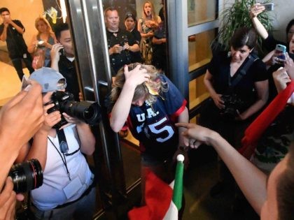 Rachel Casey gets egged (Josh Edelson / AFP / Getty)