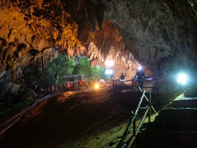 Rescuers work to extract Thai soccer team from cave in Thailand.