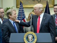 Trump-Rand-Paul-smiles-hand-shoulder-getty U.S. President Donald Trump, right, acknowledges US Senator Rand Paul (R-KY), left, prior to signing H.J. Res. 38, disapproving the rule submitted by the US Department of the Interior known as the Stream Protection Rule in the Roosevelt Room of the White House on February 16, 2017 in Washington, DC. …