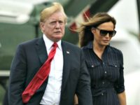 Trumps President Donald Trump and first lady Melania Trump walk from Marine One to board Air Force One at Morristown Municipal Airport, in Morristown, N.J., Sunday, July 22, 2018, en route to Washington after staying at Trump National Golf Club in Bedminster, N.J.