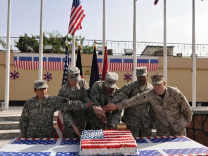 US soldiers cut a cake in celebration of the 4th of July, the US Independence Day, on July 4, 2009. US President Barack Obama has made Afghanistan the centre-piece of his foreign policy, dispatching an extra 21,000 American troops as part of a sweeping new war plan to stabilise the …