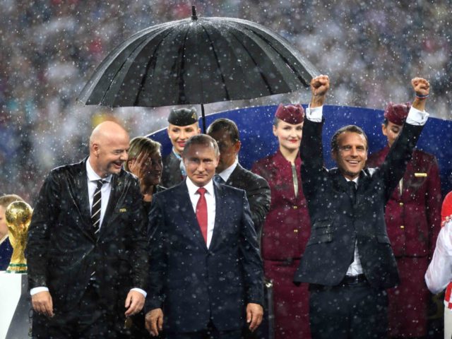 Vladimir Putin umbrella (Shaun Botterill / Getty)