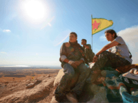 British prosecutors have dropped terror charges against an ex-soldier who … KOBANE, SYRIA - JUNE 20: (TURKEY OUT) A Kurdish People's Protection Units, or YPG fighters stand near a check point in the outskirts of the destroyed Syrian town of Kobane, also known as Ain al-Arab, Syria. June 20, 2015. Kurdish fighters with the YPG took full control of Kobane and …