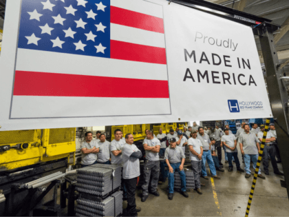 Workers at the Hollywood Bed Frame Company attend an event to mark the company's upcoming expansion which will double the manufacturer's workforce, adding 100 new local jobs, at the company's factory in Commerce, California, seven miles (11 km) southeast from downtown Los Angeles, April 14, 2017. Hollywood Bed Frame says …