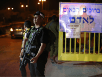 attack A picture taken on July 26, 2018 shows Israeli security forces at the Adam settlement in the occupied West Bank where a stabbing attack took place. - Three Israelis were wounded in a knife attack in a West Bank settlement close to Ramallah, the Israeli army said. (Photo by Ahmad …