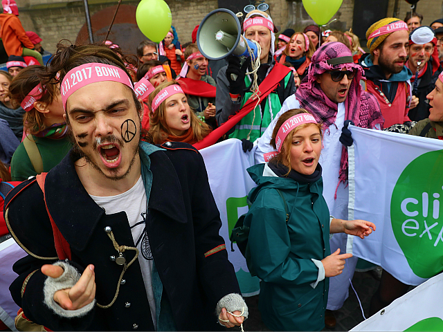 BONN, GERMANY - NOVEMBER 04: Climate change activists gather to march to protest against c