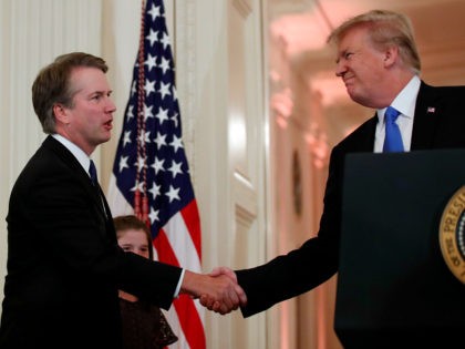 President Donald Trump shakes hands with Judge Brett Kavanaugh his Supreme Court nominee, in the East Room of the White House, Monday, July 9, 2018, in Washington. (AP Photo/Alex Brandon)