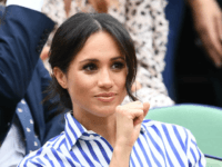 Catherine, Duchess of Cambridge and Meghan, Duchess of Sussex attend day twelve of the Wimbledon Lawn Tennis Championships at All England Lawn Tennis and Croquet Club on July 14, 2018 in London, England. (Photo by Clive Mason/Getty Images)