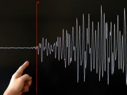 A technician of the French National Seism Survey Institute (RENASS) presents a graph on March 11, 2011 in Strasbourg, Eastern France, registered today during a major earthquake in Japan. A 8.9 magnitude quake hit northeast Japan today, causing many injuries, deaths, fires and a tsunami along parts of the country's …