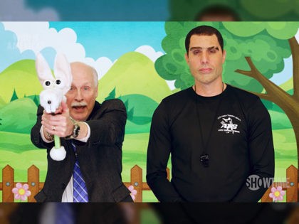 Sacha Baron Cohen has a gun rights advocate pose with a "gunny rabbit," a firearm dressed up as a toy rabbit, in the debut episode of his Showtime series "Who Is America."