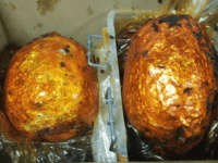 A woman faces federal narcotics smuggling charges after authorities say they found nearly 10 pounds of heroin worth about $300,000 hidden in packages that looked almost like cooked chickens at JFK Airport.