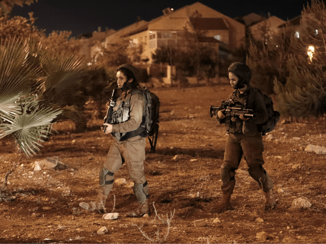 A picture taken on July 26, 2018 shows Israeli security forces at the Adam settlement in t