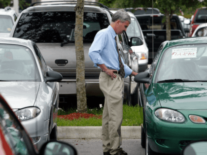 eff Split looks at the sticker price of a Ford ZX2 at World Ford July 9, 2002 in Pembroke Pines, Florida. 'The American really loves nothing but his automobile,' William Faulkner lamented in 1948. And today the words could never be truer. A poll by Progressive Insurance found that 45 …