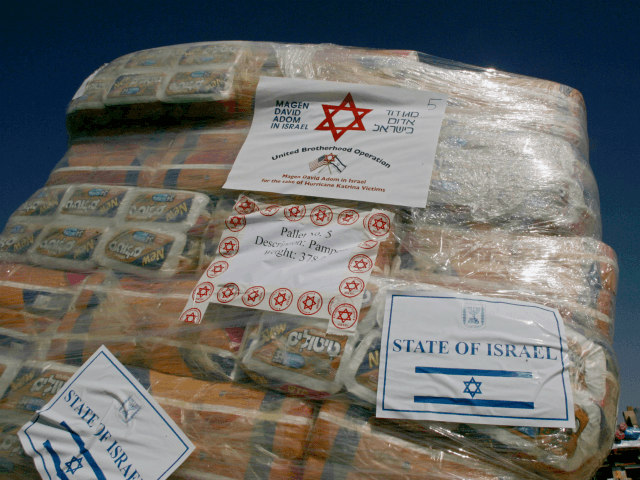 A package containing diapers stands as emergency aid supplies offered by the Israeli gover